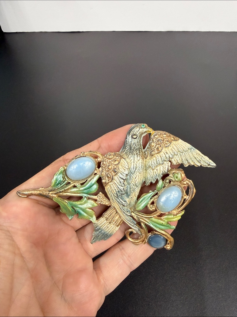 Gold-Tone Bird Brooch with Blue Cabochons and Green Enamel Leaves